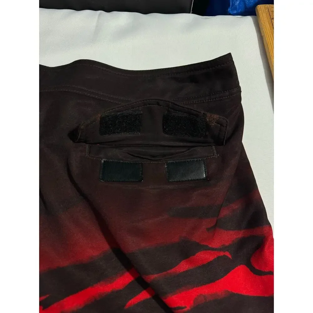 Fox Racing orange black tiger Board shorts size 36 polyester stretch blend